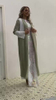 2022 Muslim Southeast Asia New Arab Solid Color Stitching Fashion Simple Belt Pocket Loose Elegant Middle East Jacket